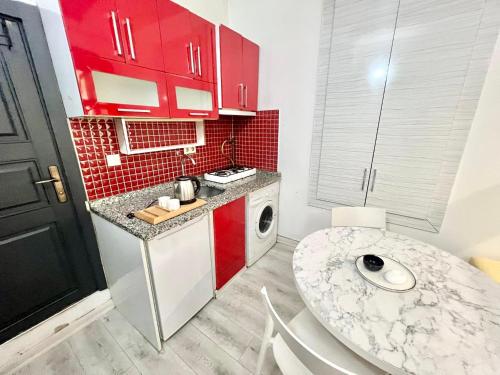 Kuchyň nebo kuchyňský kout v ubytování White Inn Taksim