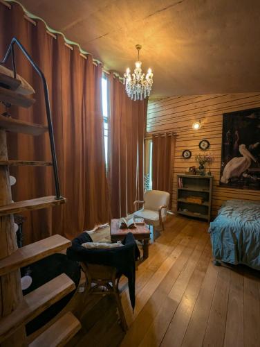 Postel nebo postele na pokoji v ubytování Cabane des deux chênes