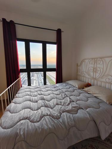Cama o camas de una habitación en Maya Bay Residence Splashmania Gamuda Cove