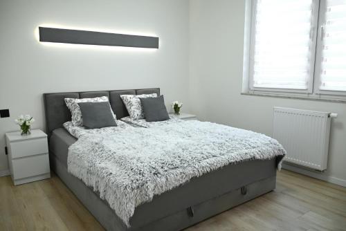 Katil atau katil-katil dalam bilik di Comfortable flat with garden