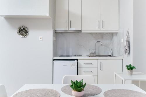 Gallery image of En Iko Christianna in Olympiada