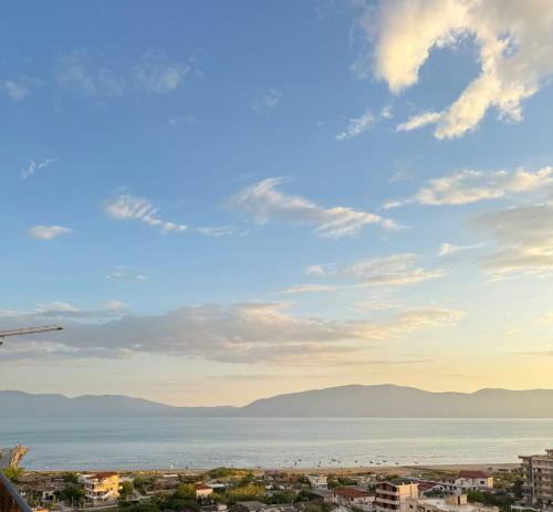 a view of the ocean and a city at ReiVal Hotel Marina Vlore in Vlorë
