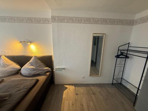 Ένα ή περισσότερα κρεβάτια σε δωμάτιο στο Ferienwohnung Sonnenblume