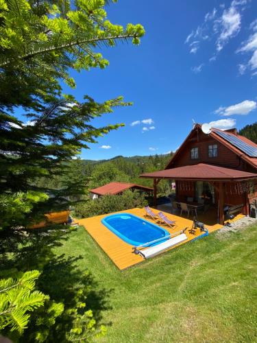 Bazén v ubytování Dom Wakacyjny Letnisko nebo v jeho okolí