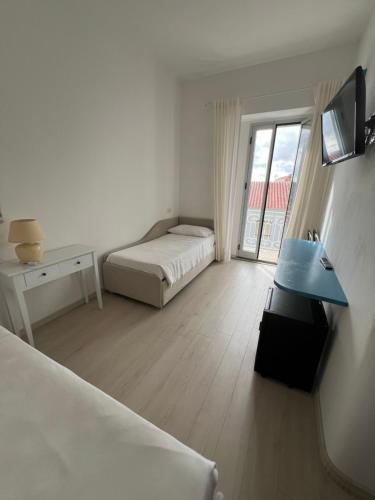 Ένα ή περισσότερα κρεβάτια σε δωμάτιο στο Hotel Da Cecco