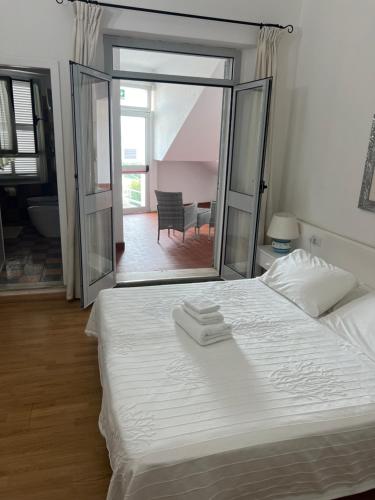 Ένα ή περισσότερα κρεβάτια σε δωμάτιο στο Hotel Da Cecco