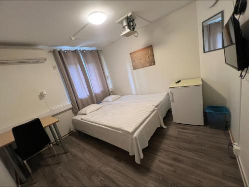 TV a/nebo společenská místnost v ubytování IzKaMaGe Hotel