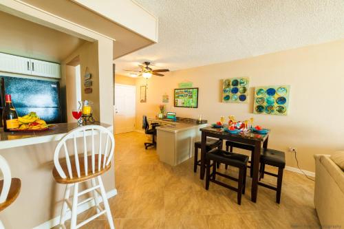 a kitchen and living room with a table and a counter at Amazing Ocean Front Stunning Views Virgin Islands Paradise 2-2 in Sion Farm