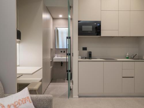 Kuchyň nebo kuchyňský kout v ubytování Luxury apartment - Cesare da Sesto 23