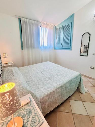 Postel nebo postele na pokoji v ubytování Villa Azzurra a due passi dal mare