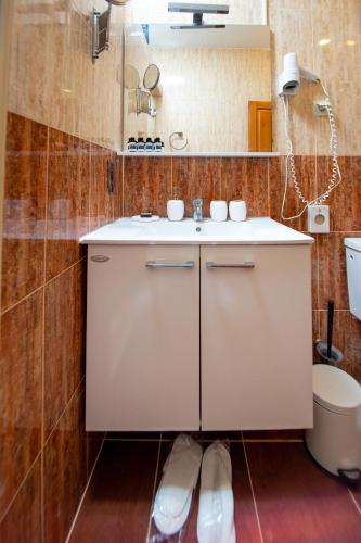 Un baño de New Hotel Kuč By Marvel