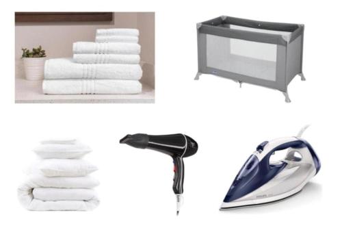 a bathroom with towels and a sink and a phone at PARIS-MONTROUGE Magnifique appartement 3 pièces de 75m2 avec PARKING - très cosy pour 1 - 8 personnes refait à NEUF -ENTIRE APARTMENT LUXURIOUS AND WARM -Montrouge Paris 14ème - Proche Aéroport Orly Parc Expositions Porte de Versailles FREE WIFI GRATUIT in Montrouge