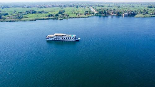 a boat in the middle of a large body of water at nile cruise king boat in Cairo