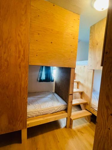 a couple of bunk beds in a room at Alaska Backpacker Hostel in Anchorage