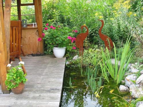 Taman di luar Holiday apartment in Altusried with sauna