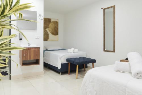 Postel nebo postele na pokoji v ubytování 33 HOTEL BOUTIQUE