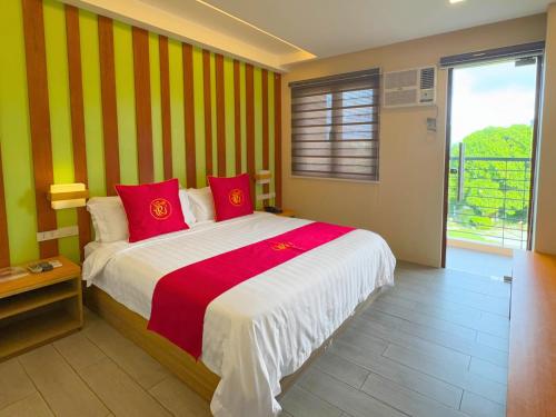Postel nebo postele na pokoji v ubytování Hotel Rosita