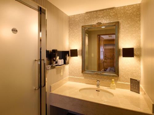 Koupelna v ubytování ORDA HOTEL
