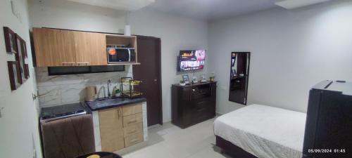 Kuchyň nebo kuchyňský kout v ubytování Hospedaje Bustamante 3155