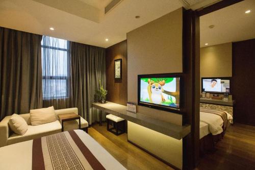 TV o dispositivi per l'intrattenimento presso Southeast Peninsula Hotel Quanzhou