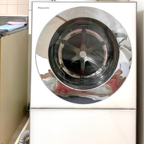 a washing machine with a wheel on top of it at LoveAsakusa Stay 6 Iriya Station Ueno Station 2ー6人 エレベーター WIFI 浅草 新宿 渋谷 銀座 築地 浅草 原宿近い in Tokyo