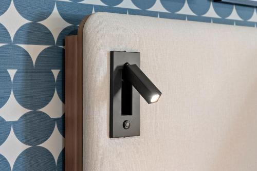 a switch on a door with a number one on it at Star Motel in San Francisco