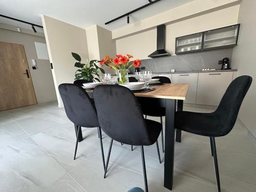 Kuchyň nebo kuchyňský kout v ubytování SOLAPART Apartamenty
