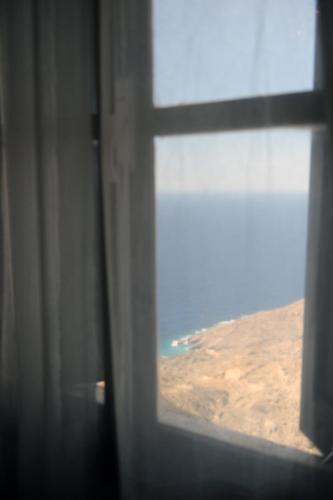 a window view of the desert from an airplane at Oxo Kamara Apartment in Karpathos Town