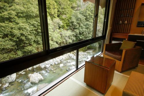 Gallery image of Hananosato Onsen Sansuikan in Takatuki