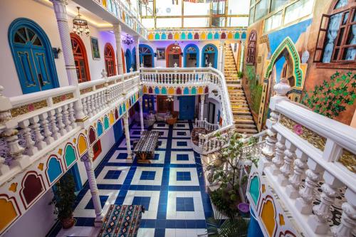 a view of the lobby of a building with colorful tiles at Ancient Road Yunju in Kashgar