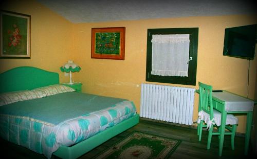 Кровать или кровати в номере Locanda del Viandante