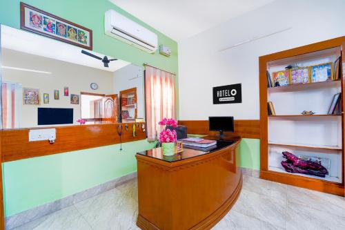 Μια τηλεόραση ή/και κέντρο ψυχαγωγίας στο Hotel O Singanallur Coimbatore