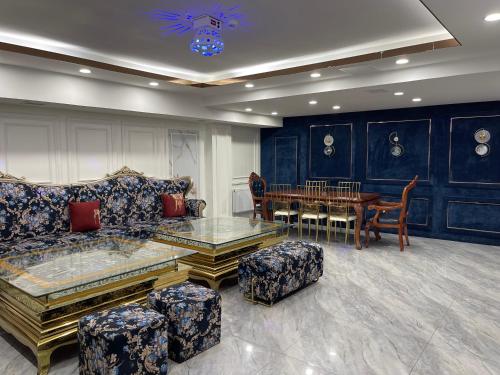 a living room with a couch and a table at Numt Guren Resort in Ulaanbaatar