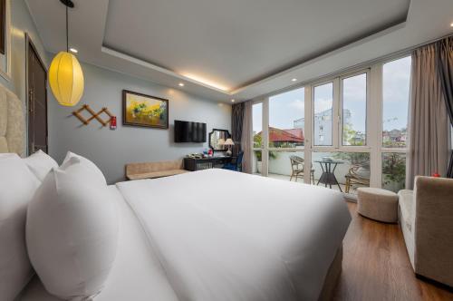Katil atau katil-katil dalam bilik di Golden Amour Hotel