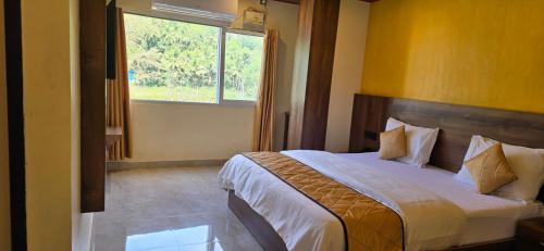 Postel nebo postele na pokoji v ubytování Andaman Beach Resort