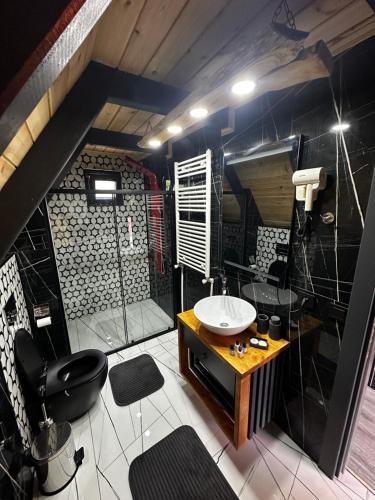 Koupelna v ubytování Peleri Suit Bungalow