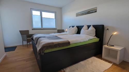 Ένα ή περισσότερα κρεβάτια σε δωμάτιο στο Osthafen