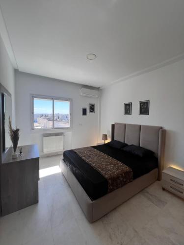Katil atau katil-katil dalam bilik di Happiness Apartment