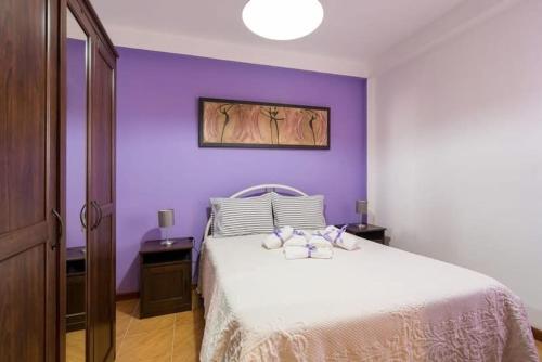 En eller flere senge i et værelse på Casa do Ceira