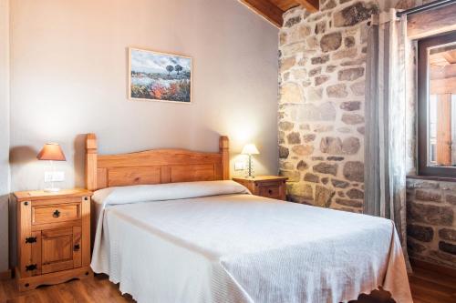 Ένα ή περισσότερα κρεβάτια σε δωμάτιο στο Casa Abuela Herminia