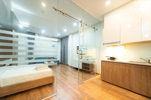 Ένα ή περισσότερα κρεβάτια σε δωμάτιο στο Jade house Hồ Con Rùa