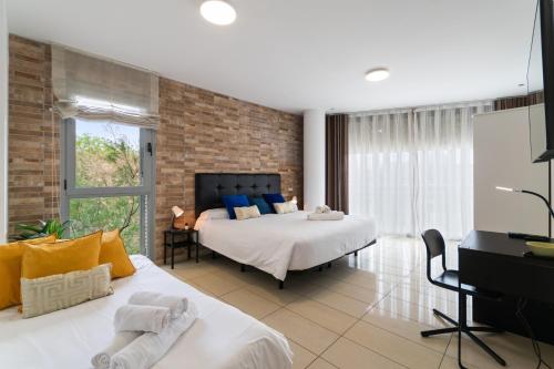 Fira Suites - Habitaciones privadas en Apartamento compartido