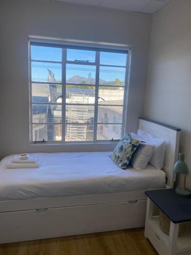 Ένα ή περισσότερα κρεβάτια σε δωμάτιο στο Pistachio Self Catering