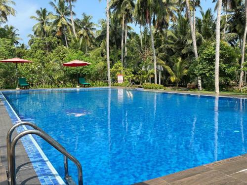 Bazén v ubytování Nilawin Hotels & Resorts nebo v jeho okolí