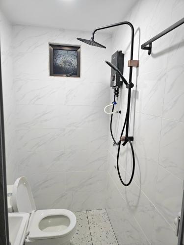 Koupelna v ubytování Adam Homestay