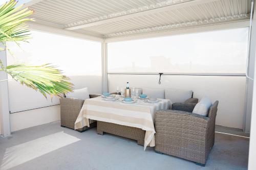 Khu vực ghế ngồi tại Apartamento Casa Gallardo