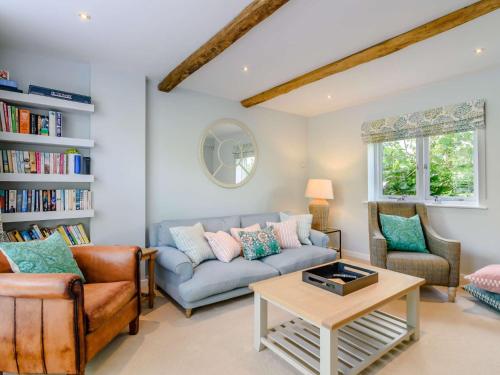 a living room with a couch and a table at 2 Bed in Goudhurst 51229 in Goudhurst