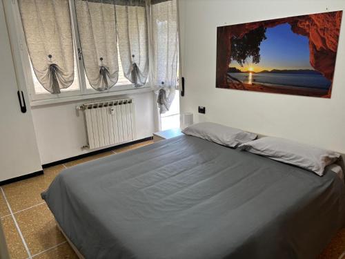 Postel nebo postele na pokoji v ubytování Casa Marosa - Riviera Ligure