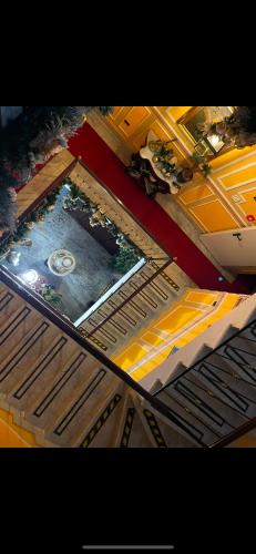 an overhead view of a church with a pool of water at Hotel Amadeus in Caserta