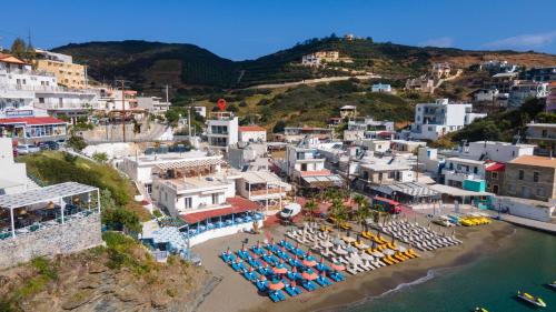 an aerial view of a town with a beach at Villa Iris, beachfront, with jacuzzi, up to 9 guests, Mpali beach, Rethymno! in Balíon